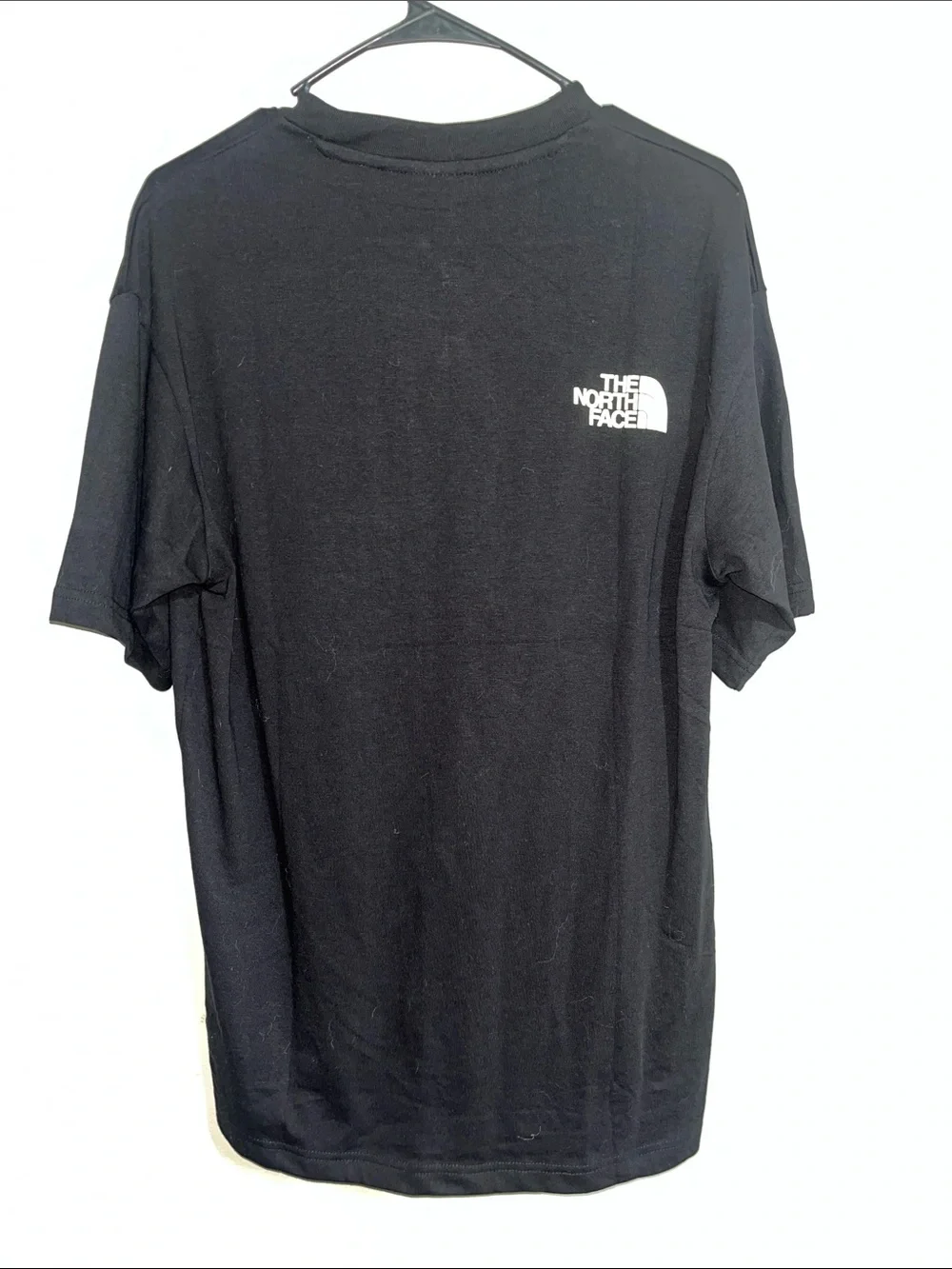 The North Face Black Tee with Purple & Yellow Logo